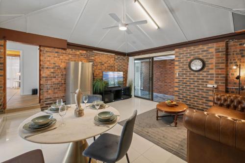 Robertson House | Urban Comfort Cozy and Convenient with a Shared Pool
