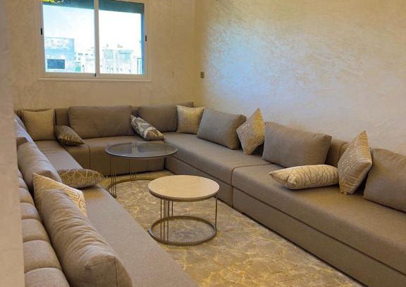 Lotissement Mehdia Apartment | Urban Oasis: Stylish and Spacious Apartment with Serene City Views