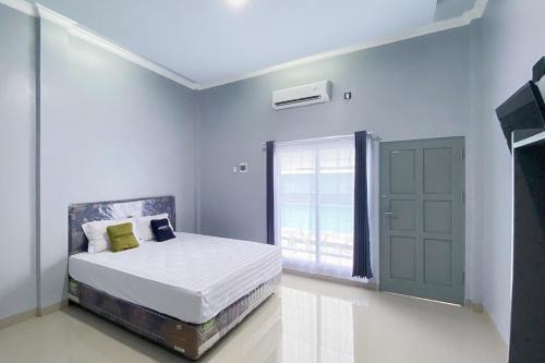 Palangkaraya Hotel | Urbanview Hotel Menteng Jaya GH Palangka Raya