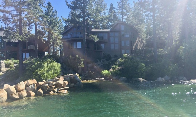 Elk Point House | Breathtaking Lakefront Home- Private beach-Fabulous sunsets-Paddleboards & canoe
