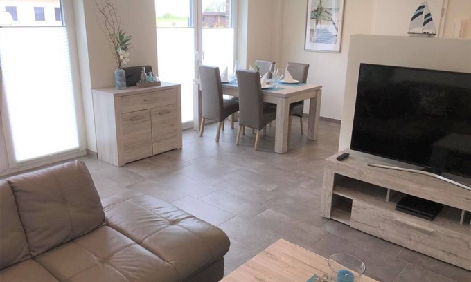 Fedderwardersiel Condo | Vacation apartment Seestern with sauna, directly on the dike