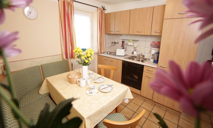 Kirchanschoring Apartment | Vacation apartment no. 5 up to 4 persons, 45 sqm, on the ground floor with 2 bedrooms, terrace with view towards the lake