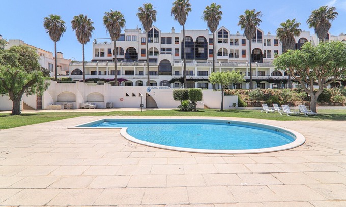 Santa Eulalia Apartment | Vacation Apartment "Apartamentos Ninho das Gaivotas 509" with Pool, Wi-Fi, A/C, Balcony & Garden; Parking Available