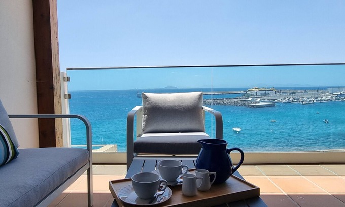 Playa Blanca Apartment | Vacation Apartment 'Seaview Limones' with Sea View, Private Terrace and Wi-Fi
