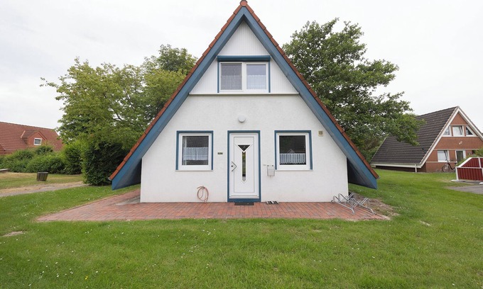 Dorumer Neufeld House | Vacation home Vogelsand 2, suitable for allergy sufferers and close to the beach.