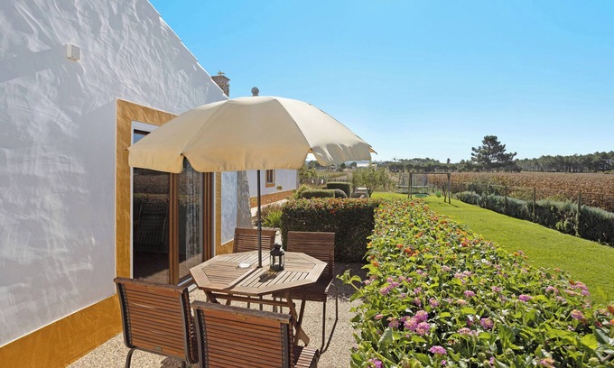 Camarate House | Vacation Home Monte do Tanoeiro - Casa Adega with Wi-Fi & Garden