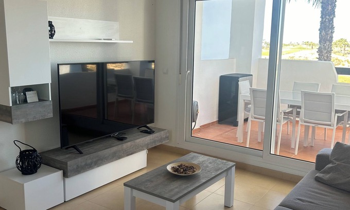 Roldan Apartment | Very well-equipped family apartment in a quiet golf course with swimming pool.