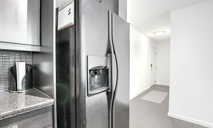 Victoria Park House | Vetro- DT CONDO, Sleeps 4, W/D to Stampede