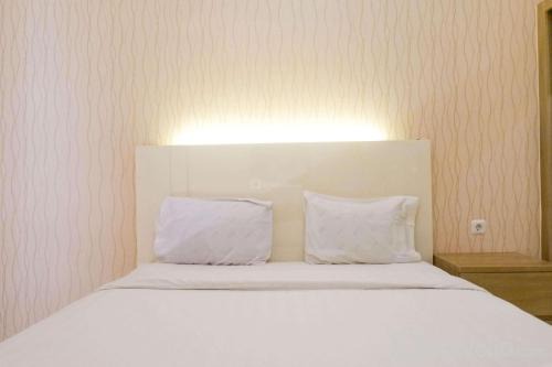 Surabaya Apartment | Vibrant Modern Studio Room at Bale Hinggil Apartment By Travelio