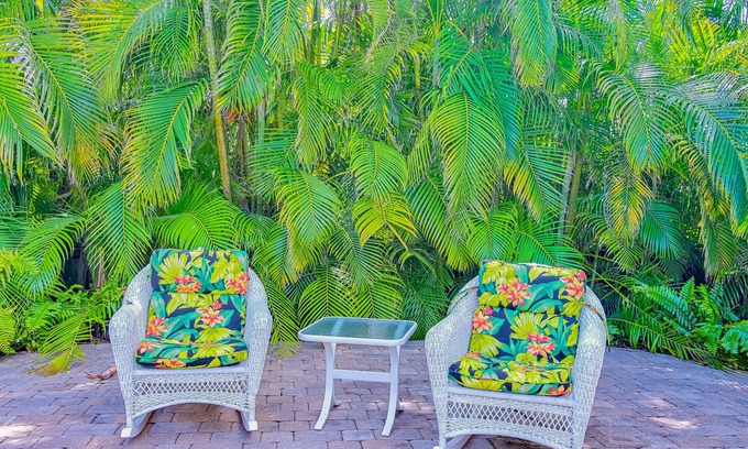 East Naples House | Vibrant villa with private pool, outdoor area, screened lanai, grill, AC, & W/D