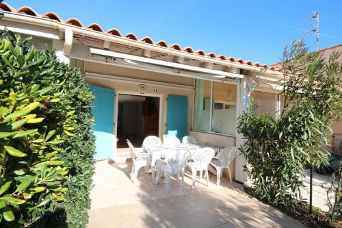 Portiragnes-Plage Villa | Villa 4 couchages terrasse sud parking piscine commune dans résidence sécurisée à 200m de la mer LRMA34