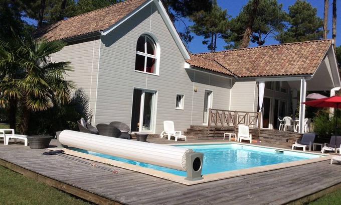 Biscarrosse Villa | VILLA 4 *, quiet, on golf course, heated pool, beaches, lake, ocean,