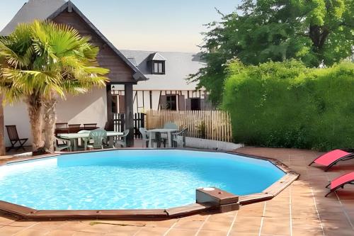 Mesnil-en-Ouche Villa | Villa charmante dans les vergers de Normandie avec piscine privée.