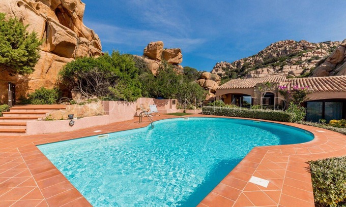 Costa Paradiso Villa | Villa Corbezzolo Giallo: with terrace, shared pool and barbeque