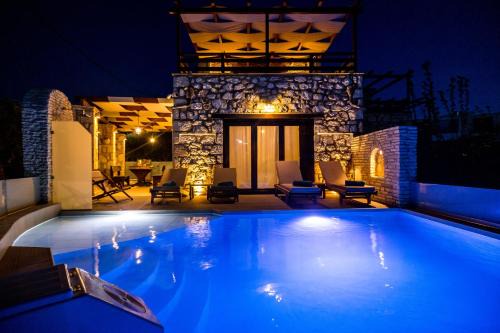 Psarou Villa | Villa Diamante -Seafront Stone Villa for 5 with Stunning Sunset Views By Villa Mana Gers