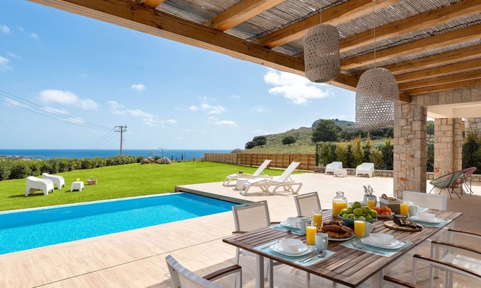Pefkos Villa | Villa Ikaros is a deluxe 3 bedroomed villa with a large private heated spa pool