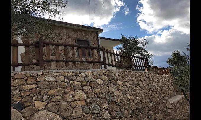 Dorgali Villa | VILLA in Sardinian stone surrounded by greenery. Panoramic terrace, BBQ and relaxation area