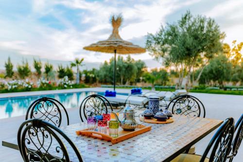 Ida Ougourd Villa | Villa Isaac et Seghir , Casa Lila Gardens Piscine chauffée