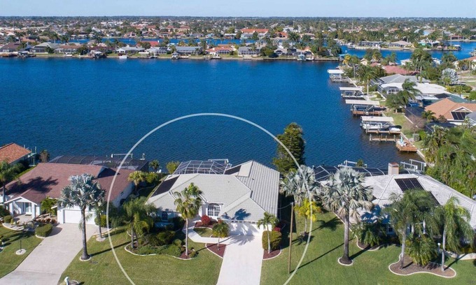 Eight Lakes Villa | Villa Melima - Stylishly Furnished Lakefront Home with Gulf Access, Amazing Pool Area