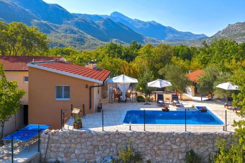 Tucepi House | Villa Melita - Heated pool, Speed Internet within Nature Park