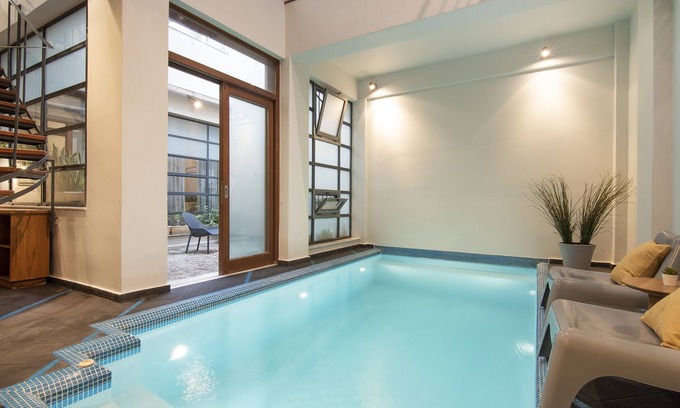 Kerameikos Villa | VILLA MELITI: Indoor pool, down town