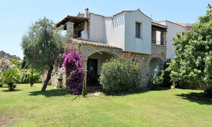 Lotzorai Apartment | Villa Menhir. Mediterranean garden. Mountain view.