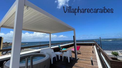 Le Moule Apartment | VILLA PHARE CARAÏBES Guadeloupe - Rooftop Jacuzzi & Ocean View