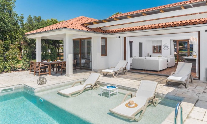 Bale Villa | Villa Porto Bus Beachfront by Villas Guide