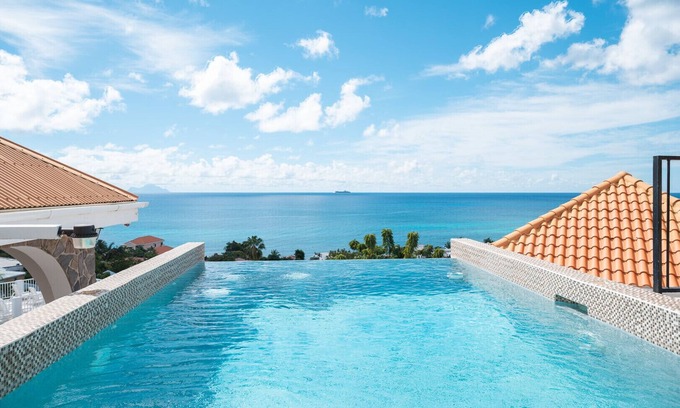 Pelican Key Villa | Villa Seaclusion accommodates 20 guests 10 beds 6 villas Ocean view pool