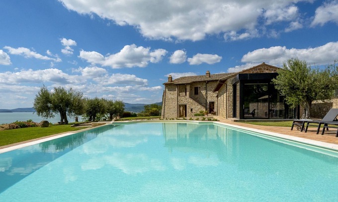 Torricella Other | Villa Trasimena is a property with great character, located in a truly enviable position overlooking