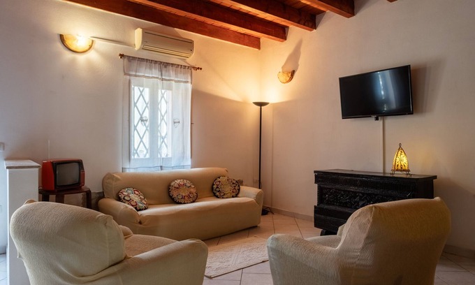 Riola Sardo Villa | Villa Vintage by Propertize | giardino e palestra