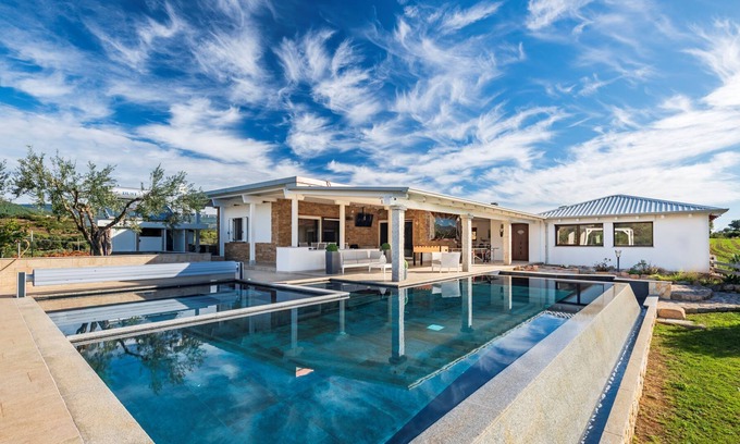 Talana Villa | Villa with heated swimming pool surrounded by greenery