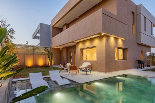 Tassoultante Villa | Villa Yas, 4 Chambres, 20min du Centre, Piscine Chauffée, Cuisinière, Chauffeur, Air Hockey, Ping-Pong & Jeux de Société