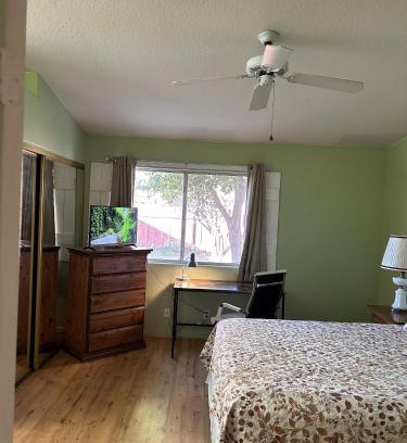 Hemet House | Vineyard Vista Suite with TV and private bathroom