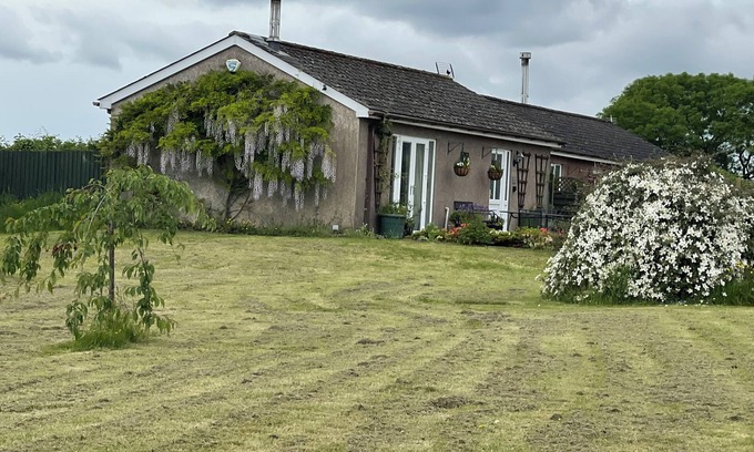 Coed-Y-Paen House | Visit Wales 4 Star, rural bungalow - Sauna, jacuzzi, play area and Free Wi-fi