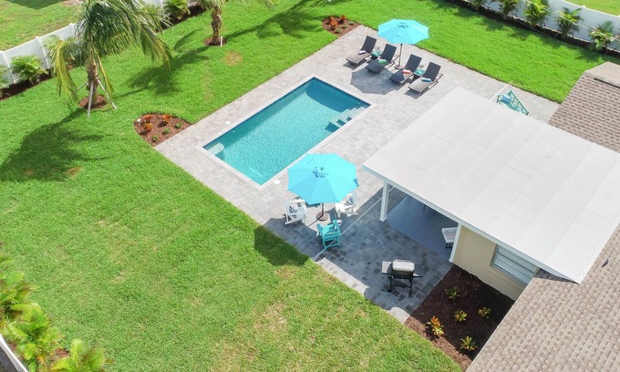 Shore Acre Heights House | Viva La Flamingo! 10 Min to Anna Maria, Heated Pool, Pet Friendly