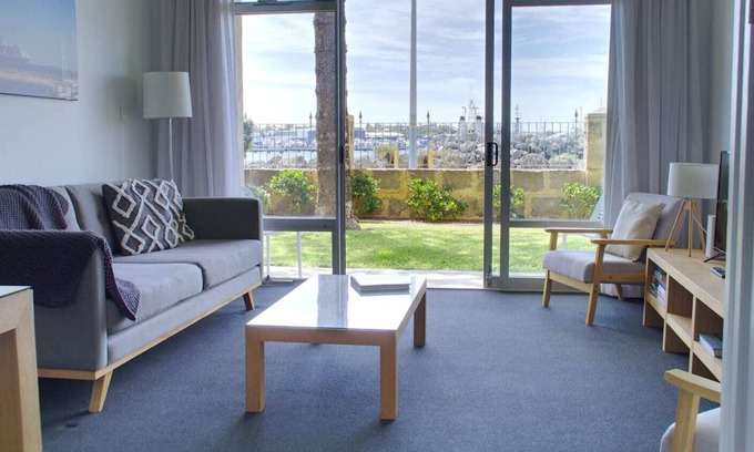 Fremantle Apartment | Wake up to sweeping harbour views in this modern, split-level apartment located between Fishing Boat Harbour and Challenger Harbour. Whether you're a couple, a family, or here on business, this peaceful retreat offers the best of coastal charm and ci