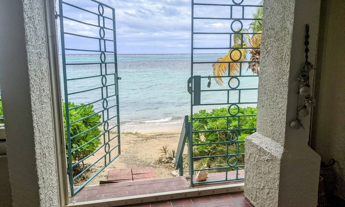 Estate Golden Rock Condo | Walk out to the beach