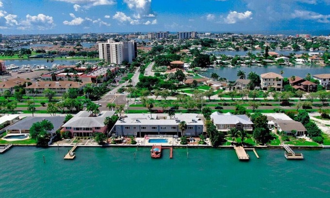 Treasure Island Condo | Walk to beach- 2 PM check in-Boat dock-Pool-amazing views