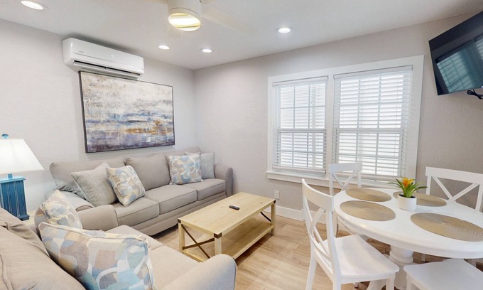 Madeira Beach Condo | Walk to Beach & Johns Pass Village! Community Heated Pool ~ Private Patio ~ Free Parking & Amenities