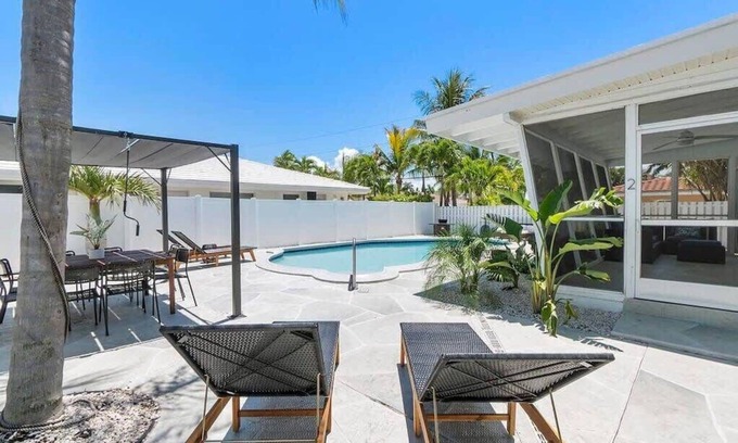Dolphin Isles Apartment | Walk To The Beach | Fire pit + Pool | Coconut Unit