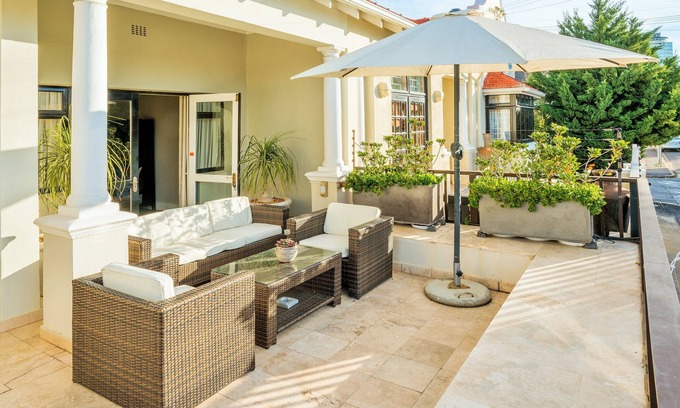 Green Point House | Walk to the Beach from a Cape Dutch Heritage Bungalow