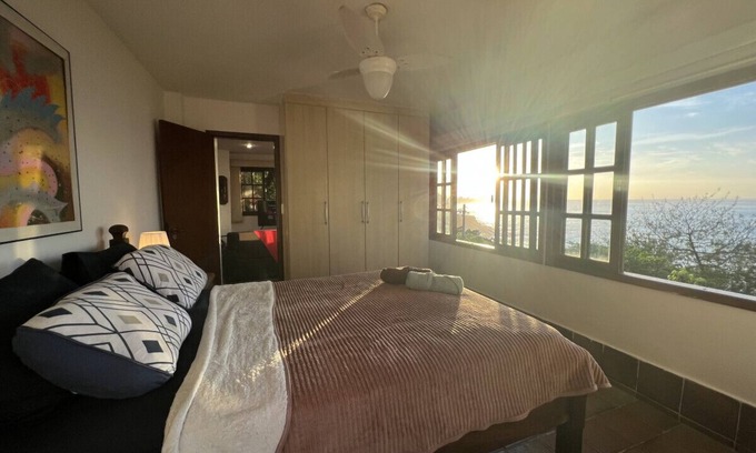 Leblon Apartment | Wall to wall windows with views across the ocean, just 5 minute walk to the beach in a safe location