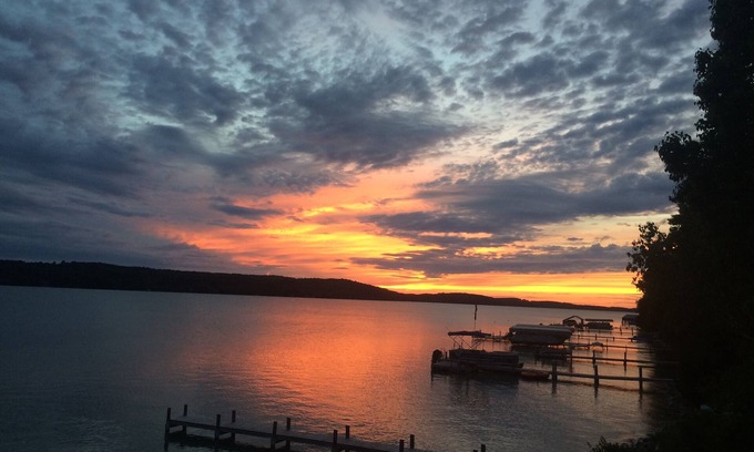 Petoskey Cottage | WALLOON LAKE SUNSETS! BEST WEST ARM LOCATION!