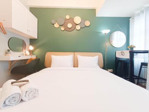 Panakkukang Apartment | Warm and Homey Studio at Vida View Makassar Apartment By Travelio