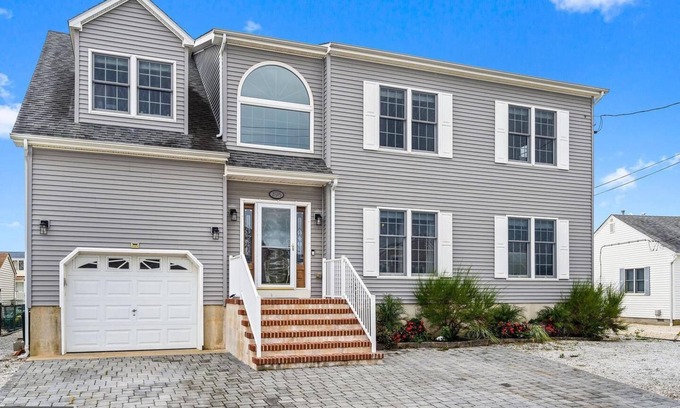 Beach Haven West House | Water Front Lagoon Home - Private Dock w/Kayaks & Paddleboards