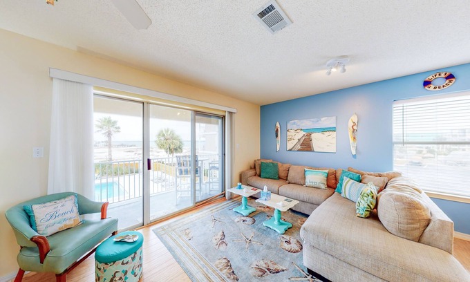 Navarre Beach Condo | Water-view haven with sound-view balcony, shared pool, WiFi, and AC