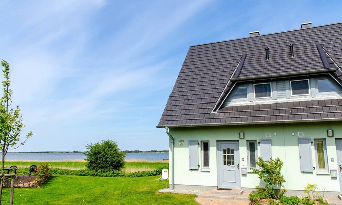 Neuenkirchen House | Water views, 1 A location overlooking the water/harbor, sauna, fireplace, WLAN