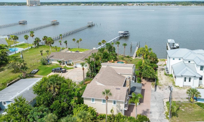 Daytona Beach House | Waterfall Grotto Pool | Sunset on the Riverfront | Dock | Bring the Boat