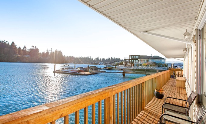 Rollingbay House | Waterfront home on Puget Sound lagoon with canoe & rowboat